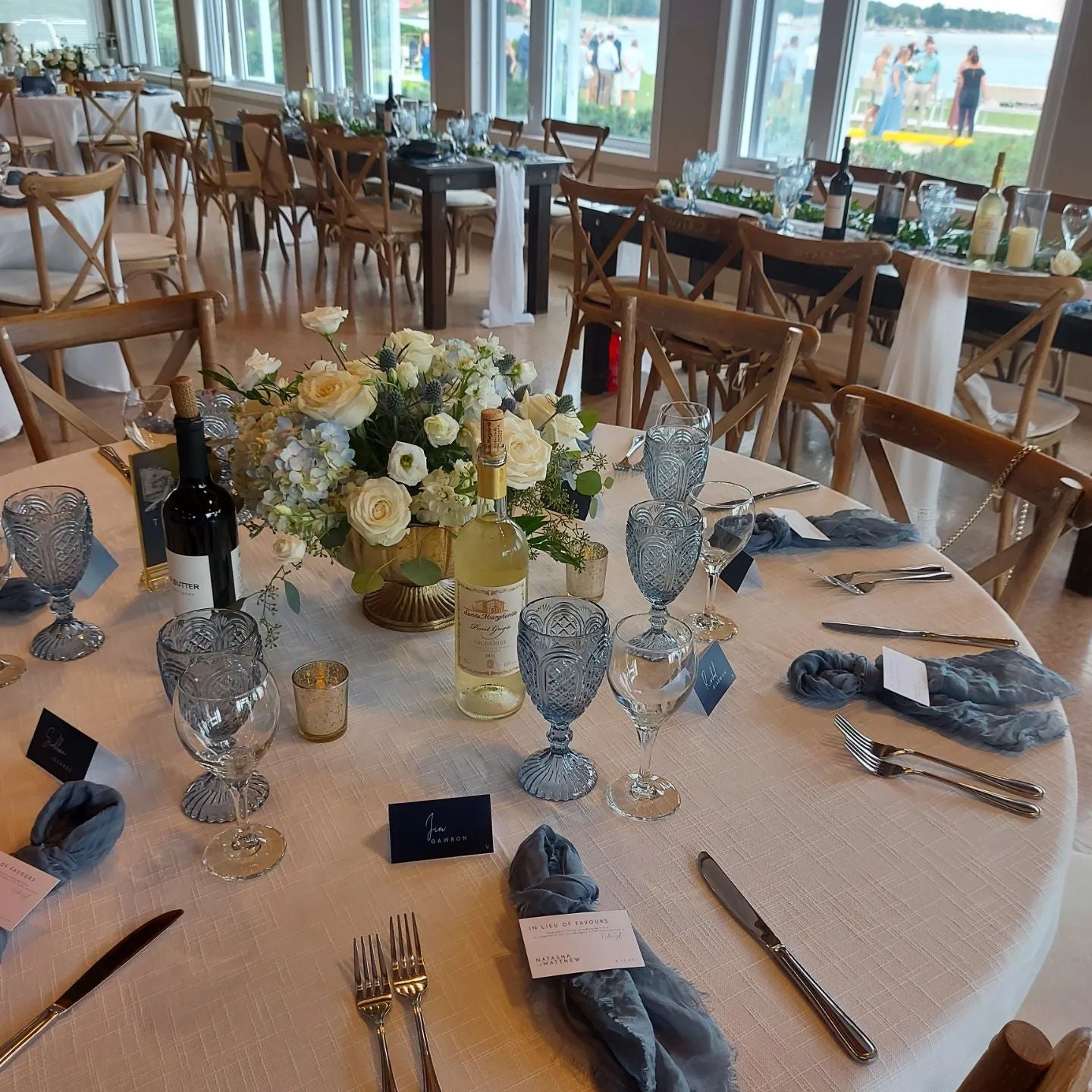 Blue glasses blue napkins harvest chairs wedding reception