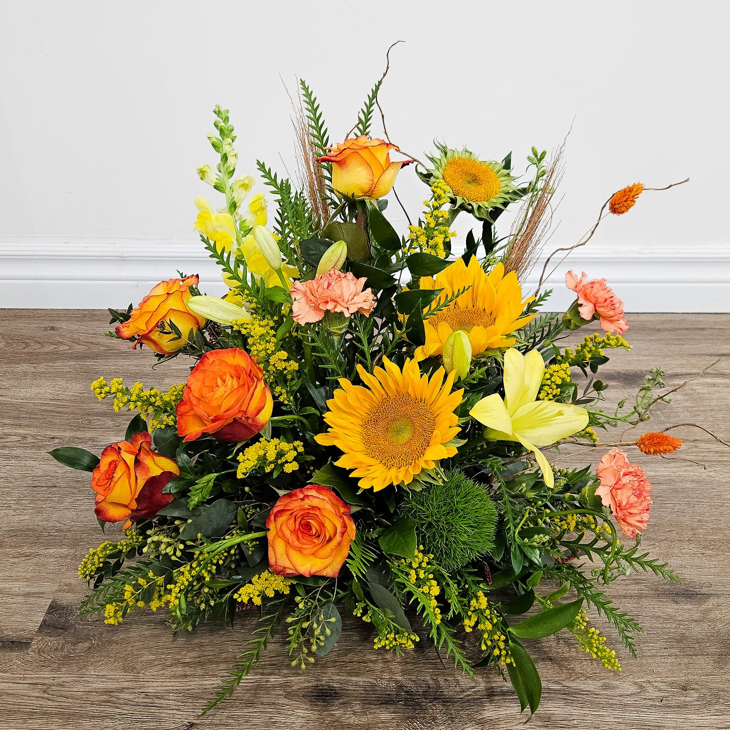 Yellow orange tribute funeral flowers 