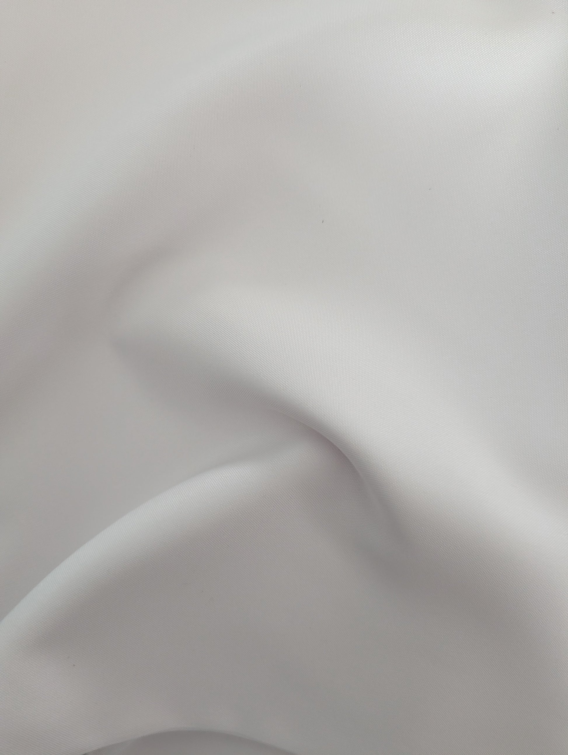Close-up of white tablecloths