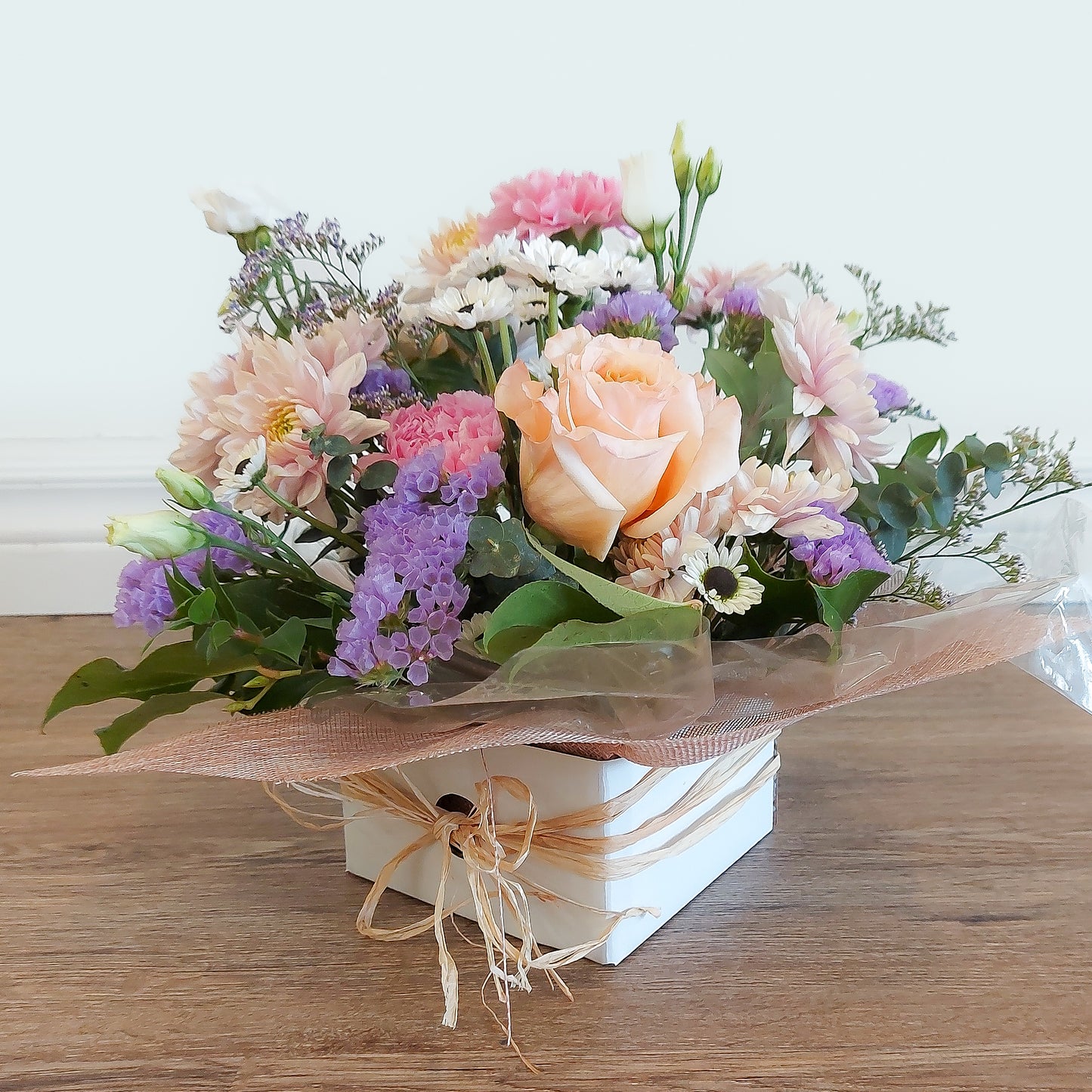 Mixed flower arrangement in box