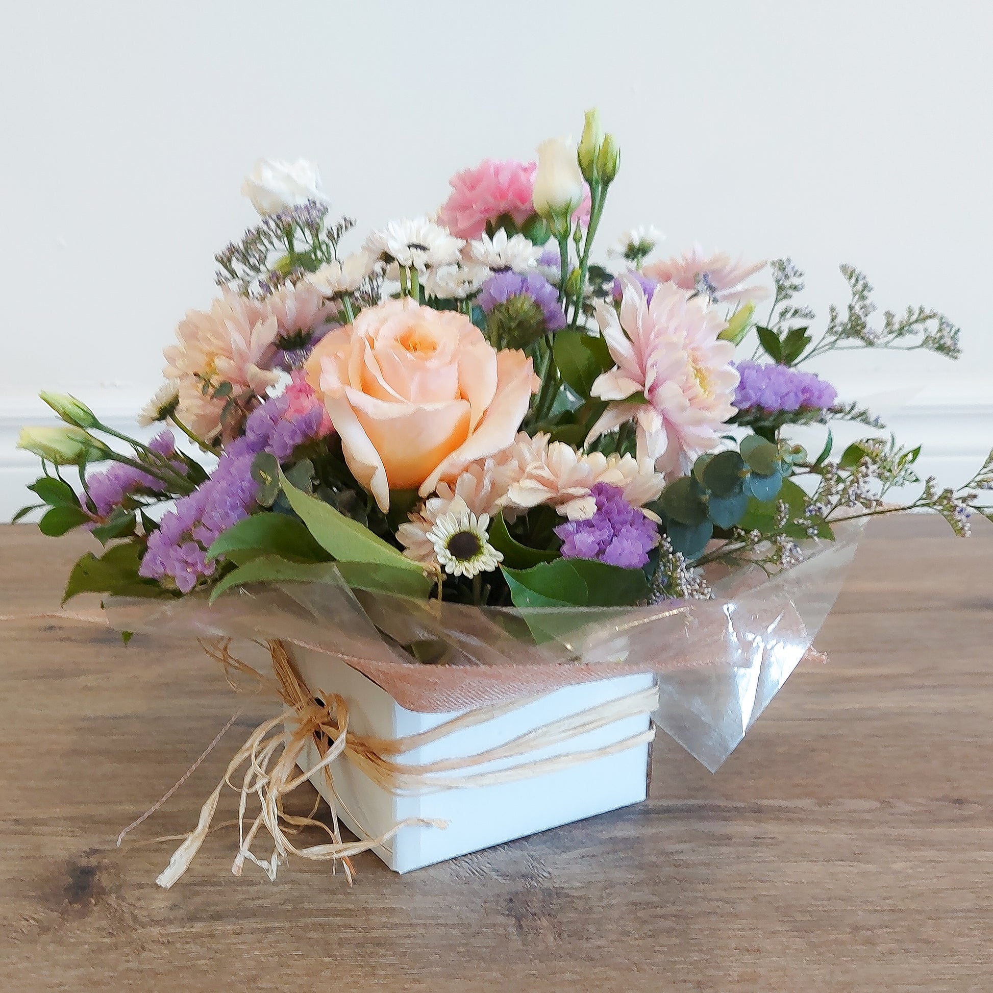 Mixed flower arrangement in box