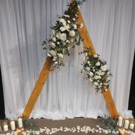 White floral wedding arch