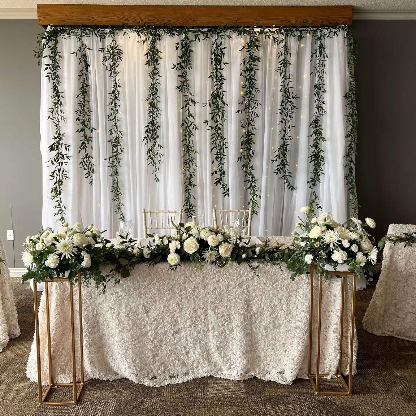 Bridal head table sweetheart reception table with flowers